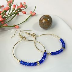 Beaded 14k Gold Filled Hoop Earrings, Beaded 14k Gold Filled Round Earrings, 14k Gold-filled Beaded Round Earrings, Blue Beaded 14k Gold-filled Jewelry, Gold Hoop Earrings With Round Beads, Gold 14k Gold-filled Hoop Earrings With Round Beads, Adjustable Gold Hoop Earrings With Faceted Beads, Blue Wire Wrapped Hoop Beaded Earrings, Blue Beaded Jewelry In 14k Gold Filled