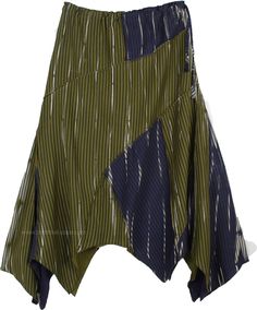 An everyday fun lightweight cotton asymmetrical hem hippie patchwork skirt. It has a vertical pattern across the fabric giving the skirt more color. The patchwork is in two kinds of colors - Dark green or Henna and blue color in a similar print. The side zipper and a drawstring on the waist ties to the side and gives the skirt flexibility across an extra small to a medium waist. The material is very light cotton, that will be perfect for inland heat in the summers. This skirt has a free fall tha Casual Skirt With Patchwork And Asymmetrical Hem, Casual Patchwork Skirt With Asymmetrical Hem, Casual Skirt With Asymmetrical Hem And Patchwork, Cotton Patchwork Asymmetrical Skirt, Summer Patchwork Wrap Skirt, Bohemian Relaxed Skirt With Asymmetrical Hem, Bohemian Skirt With Asymmetrical Hem And Lined Detail, Bohemian Skirt With Asymmetrical Hem And Lining, Bohemian Cotton Skirt With Asymmetrical Hem