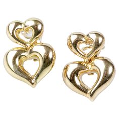 VCA Heart Shaped Earrings in 18K Gold. Each earring has two smooth, polished hearts with rounded edges. The second heart hangs on the first adding an extra touch of romance to this already charming jewel. Weight: 16.70 gr. Dimensions: 1.6cm x 2.07cm x 0.4cm Gold mark on the jewel. Status: As new Jewel delivered in a luxurious box with a certificate of authenticity. Heart Shaped Earrings, Two Hearts, Van Cleef Arpels, Van Cleef, Tear Drop, Heart Pendant, Beautiful Jewelry, Heart Shapes, 18k Gold