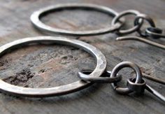 "These lightweight dangling hoop earrings have a nice rustic appeal with the antiqued silver finish. The Details ∞ Artisan handmade ∞ Lightweight dangling hoops (ring measures 7/8\" diameter) ∞ Total length 2 1/4\" ∞ Solid Sterling Silver ~ antiqued finish ∞ Made to order ∞ Gift box included ∞ Made in the USA VISIT OUR SHOP: http://www.PoseidonsBooty.etsy.com SHOP POLICIES: http://www.etsy.com/shop/PoseidonsBooty/policy" Artisan Oxidized Hoop Earrings, Artisan Hoop Earrings With Oxidized Finish, Rustic Nickel-free Dangle Jewelry, Rustic Handmade Metal Jewelry, Oxidized Circle Hoop Earrings As Gift, Gift Circle Hoop Earrings With Oxidized Finish, Unique Small Hoop Jewelry With Oxidized Finish, Unique Oxidized Round Hoop Earrings, Unique Oxidized Hoop Earrings