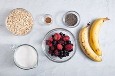 ingredients to make an oatmeal smoothie laid out on a white surface