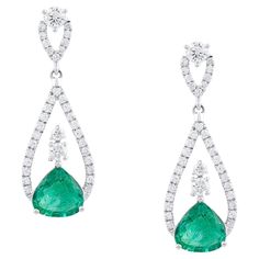 Tresor Diamond Earring features 0.70 cts diamond and 2.04 cts emerald in 18k white gold. The Earring are an ode to the luxurious yet classic beauty with sparkly diamonds. Their contemporary and modern design makes them versatile in their use. The earrings are perfect to be worn daily, at parties, music galas, charity events, conferences, and even weddings. Emerald Diamond Earrings, Charity Events, Diamond Earring, Emerald Diamond, Classic Beauty, Women Accessories Jewelry, Accessories Jewelry, Diamond Jewelry, Turquoise Necklace