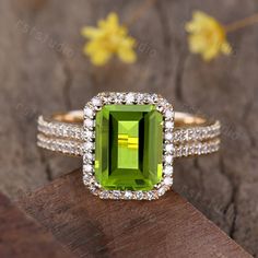 Peridot engagement rings for women,half eternity wedding band,diamond wedding ring,alternative engagement ring Main ring: 8x10mm Emerald Cut VS Natural Green Peridot 0.5ctw Round Cut Natural SI-H Diamonds Band width approx 4mm Half eternity diamond band Diamond halo Prong pave set Return and refund: We provide 30days return and exchange service. (Custom order is made by Unique demand, will be non-returnable and non-refundable). As every item in my shop is handmade to order, if you unsatisfied wi Luxury Green Topaz Engagement Ring, Luxury Green Peridot Diamond Ring, Peridot Engagement Rings Diamond, Luxury Tsavorite Birthstone Ring For Engagement, Luxury Rectangular Birthstone Ring For Gift, Engagement Rings Peridot, Peridot Ring Engagement, Peridot Wedding Ring, Stone Rings For Women