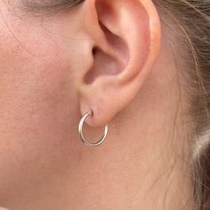 SOLID STERLING SILVER HOOP EARRINGS: Such a cute little pair of everyday earrings made with solid sterling silver, these little hoops are comfortable to wear for long periods and feature a secure latch closure. Easy to take on/off but secure when wearing.  Comes in a gift box, perfect for gift giving. Earring size is approximately 15mm (a little over 1/2 inch).  Also available in a smaller 10mm size here: www.etsy.com/listing/1452991948/tiny-silver-hoops-sterling-silver-dainty Tiny White Gold Huggie Earrings For Everyday, Simple Small Hoop Hypoallergenic Earrings, Simple Hypoallergenic Small Hoop Huggie Earrings, Classic Tiny Sterling Silver Huggie Earrings, Everyday Sterling Silver Huggie Earrings, Hypoallergenic White Gold Huggie Earrings For Everyday, Simple Nickel Free Small Hoop Huggie Earrings, Sterling Silver Hypoallergenic Hoop Earrings For Everyday, Tiny Sterling Silver Huggie Earrings For Everyday