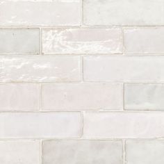 a white brick wall that is very close up