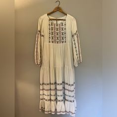 Anthropologie Size 8 Maxi Dress Never Worn Long Beige Spring Dress, Beige Long Dress For Spring, Long Beige Dress For Spring, White Fitted Boho Midi Dress, Midi Dress With Floral Embroidery For Day Out, Floral Embroidered Midi Dress For Day Out, Floral Embroidery Midi Dress For Day Out, Flowy Midi Maxi Dress With Floral Embroidery, Flowy Floral Embroidered Midi Maxi Dress