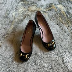 Authentic Gucci Jolene Square Toe Black Patent Leather Pumps Styled With 3.5” Heels This Iconic Antique Gold Horsebit Details On Uppers Great Condition Slight Wear On Soles A Dot Spot On Back Retail $825 Leather Heels With Horsebit Detail For Office, Chic Heels With Horsebit Detail For Office, Elegant Heels With Horsebit Detail, Gucci Formal Low Heel Shoes, High Heels With Horsebit Detail, High Heel With Horsebit Detail, Designer Formal Heels With Horsebit Detail, Gucci Horsebit Heels For Office, Gucci Almond Toe Heels For Office