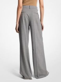 These wide-leg trousers combine timeless tailoring elements, like front pleats and crisp leg creases, with stretch-infused virgin wool sourced from an Italian mill. A high-rise fit evokes a strong feminine aesthetic. Balance its soft hand and languid drape with pointed-toe heels. Made in Italy. Strong Feminine Aesthetic, Strong Feminine, Pleated Trousers, Michael Kors Collection, Feminine Aesthetic, Pointed Toe Heels, Soft Hands, Soft Hand, Wide Leg Trousers