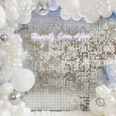 a white and silver photo frame with balloons