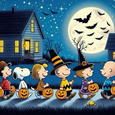 a group of peanuts dressed up as halloween characters in front of a house with bats and pumpkins