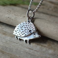 This is a sterling silver hedgehog charm made from recycled sterling silver♻️. The charm measures 16mm long with the ring and 14mm wide. It will come on a 1mm round box chain on your choice of 16", 18" 20" or 24" long. Silver Hedgehog, Silver Chain Style, Round Box, Hammered Sterling Silver, Disc Earrings, Ring Ideas, Recycled Silver, Recycled Sterling Silver, Box Chain