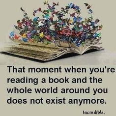 an open book with butterflies flying out of it and the words that moment when you're reading a book and the whole world around you does not exit anymore