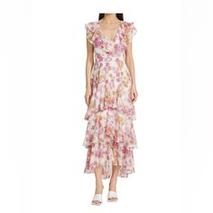 Floral Tiered Ruffle Midi-Dress Magenta Daisies Medium Wayf's Midi-Length Dress Is Decorated With A Floral Motif. Cut In A Tiered Silhouette, It Features A Ruffled Tulip Hem And A Concealed Back Zipper Closure. V-Neck Cap Sleeves Back Zipper Closure 100% Polyester Lining: 100% Polyester Machine Wash Imported Size & Fit About 50.5" From Shoulder To Hem Model Measurements: 5'10" Tall Model Is Wearing A Us Size Small Floor-length Ruffle Dresses For Daywear, Floor-length Ruffled Dresses For Daywear, Floor-length Floral Print Daywear Dress, Floor-length Floral Print Day Dress, Spring Floor-length Dresses For Daywear, Ruffled Tulip, Yellow Wrap Dress, Floral Bridesmaid Dresses, Ribbed Sweater Dress