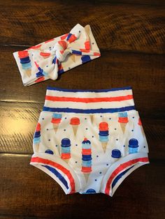 What's sweeter than a cute outfit for the 4th of July? Help your little one celebrate in style with this adorable Bummies set! The best part is ice cream is good all summer long, so your babe can keep rocking it!  *Made from Modern Jersey fabric- a lightweight drapey knit with a cotton like feel. Pre-Washed. Machine wash and dry. **ORDER BY JUNE 27TH FOR DELIVERY BEFORE JULY 4TH Playful Fitted Bottoms For Playtime, Fitted Cotton Diaper Cover For Summer, Playful Fitted Playtime Bottoms, Cute Fitted Bottoms For Playwear, Summer Cotton Fitted Diaper Cover, Fitted Bottoms For Playwear In Summer, Fitted Bottoms For Summer Playwear, Casual Summer Diaper Cover, Cute Cotton Diaper Cover For Summer