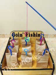 there is a fishing rod on top of the box with fishin's in it