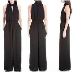 Elevate Your Wardrobe With This Stunning Black Jumpsuit From Max Studio. The Halter-Style Sleeveless Design Features A Flattering V-Neckline And A Belted Waist, Making It A Versatile Piece For Any Occasion. The Rayon Fabric Drapes Beautifully And Is Easy To Care For With Machine Wash Instructions. This Jumpsuit Comes In A Size L And Has A Regular Fit. The Sleek And Stylish Design Is Perfect For Any Season, Whether It's Summer, Winter, Fall, Or Spring. The Jumpsuit Is Brand New With Tags And Has Versatile Sleeveless Jumpsuits For Work, Black Halter Neck Jumpsuit For Work, Versatile Sleeveless Solid Jumpsuits And Rompers, Versatile Sleeveless Jumpsuits And Rompers, Versatile Sleeveless Jumpsuits And Rompers In Solid Color, White Sleeveless Jumpsuit, Black Sleeveless Jumpsuit, V Neck Tunic, Polka Dot Jumpsuit