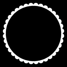 a black and white circle with scalloped edges in the center on a black background