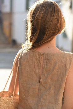 Style // A beautiful brown linen top, the perfect addition to any wardrobe The Mila Top is the perfect effortless and minimal design for the ultimate laid back look. A high neck sleeveless linen top, featuring a mother of pearl button on the back. The rounded neckline can be dressed up or down, making it your new go to top Fabric Note // Made in Italy from 100% Linen Sizing Advice // Available in three sizes, S: Bust: 36" Length: 20" M: Bust: 38" Length: 21" L: Bust: 40" Length: 22" Care Instruc Sleeveless Brown Linen Top, Brown Sleeveless Linen Top, Neutral Sleeveless Everyday Tops, Everyday Neutral Sleeveless Tops, Linen Tops, Linen Top Women, Clothes Basket, High Neck Sleeveless, Linen Set