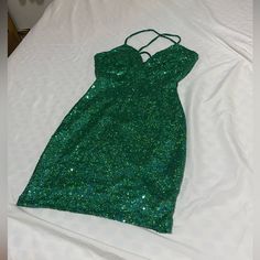 Two Brand New Party Dresses, Never Worn, Both Are Size S And Perfect For Different Occasions. One Is A Stunning Green Sequin Dress Ideal For A Glamorous Night Out, And The Other Is A Chic White Dress, Perfect For Elegant Or Formal Event. Both Dresses Are In Perfect Condition, Ready To Make You Shine!” Each Dress Is Price At $50 Green Mini Sequin Dress For Prom, Glamorous Green Mini Dress For Prom, Glamorous Green Mini Dress For Prom Season, Glamorous Green Sequin Homecoming Dress, Glamorous Green Sequin Dress For Homecoming, Green Evening Dress For Party Season, Green Mini Dress For Cocktail And Prom Season, Green Mini Length Mini Dress For Party, Green Mini Dress For Beach Party