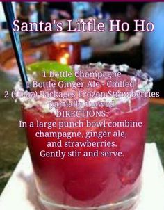 an image of a drink in a glass on top of a table with the caption santa's little ho hoo