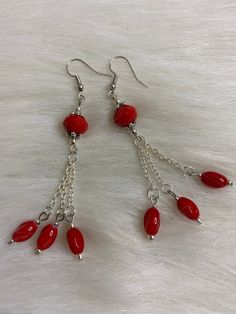 Hi Everyone ❤️,  What a fashion statement,  Handmade Earrings, Red Beads, Silver Petite Beads, Silver Small Chain, Silver Dangle Earrings. Fashion statement earrings for everyday jewelry accessories. This pretty pair is 3.5 inches long from top to bottom. Definitely perfect handmade gifts for any occasions.  Thank you for looking at my jewelry shop. Silver Wire Earrings, Jewelry Making Earrings, Red Beads, Silver Dangle Earrings, Chain Silver, Earrings Red, Pretty Earrings, Red Bead, Fun Earrings