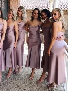 the bridesmaids are posing for a photo together