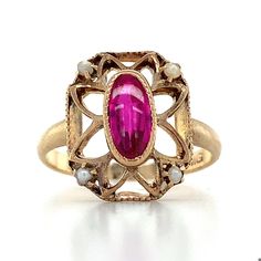 10k Yellow Gold Oval Shaped Synthetic Ruby And Pearl RingSize 5.75 2.6 Grams this is a beautiful vintage ring with this pinkish red center. This ring is in good condition while still showing its a vintage piece.  If you have any questions or concerns or would like a custom order, please message me and I will get back to you as soon as possible! serial number: AJ 521928 A Vintage Ruby Ring In 14k Gold With Oval Cabochon, Vintage 14k Gold Pink Jewelry, Vintage Pink 14k Gold Jewelry, Vintage 14k Gold Ruby Ring, Vintage Oval Cabochon Promise Ring, Collectible Oval Ruby Ring, Antique Oval Ruby Promise Ring, Antique Oval Red Ruby Ring, Heirloom Oval Ruby Ring For Collectors