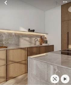 a kitchen with marble counter tops and wooden cabinets, along with an appliance on the wall