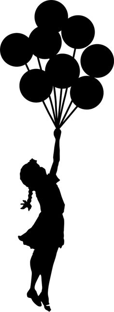 a silhouette of a person holding balloons in the air