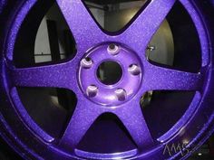 a purple wheel is shown in this image