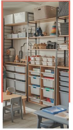 Organized playroom with shelves of toys, baskets, and storage bins, with small tables and chairs in the foreground.