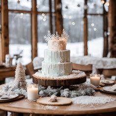 a wedding cake sitting on top of a wooden table