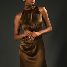 Drape yourself in luxury with the Amber Satin Asymmetrical Dress. This captivating piece features a high neck and a graceful silhouette that flows effortlessly with your every movement. The rich amber satin fabric catches the light, creating an enchanting shimmer, while the asymmetrical hemline adds a modern twist. The dramatic back sash adds a unique touch of elegance to the minimalist design. Perfect for evening soirées or special occasions, this dress allows you to make a bold, unforgettable statement. Wash At Or Below 30°c Do Not Tumble Dry Iron At Low Temperature Do Not Bleach Satin fabric is Easily washed by washing machine and hand. Avoiding squeezing the satin fabric after wash. Women Poetry, Knit Loungewear, Stocking Fillers For Her, Real Style, Dress Medium, Swimwear Outfit, Boho Women, Tie Shoes, Dress C