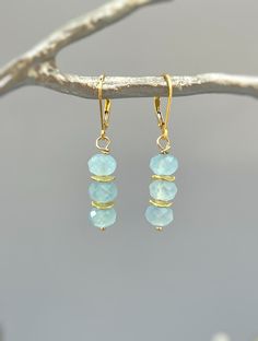 "Dainty handmade genuine aquamarine dangle earrings.  Lightweight earrings for women. Sparkling aquamarine blue gemstone rondelles hang from your choice of Sterling Silver, 14k gold Fill, or Rose Gold Fill French hook ear wires or leverbacks. Gemstone drops are dainty approx 1/4\" wide. Simple, elegant everyday earrings. These would make a lovely gift for mom or wife with a March birthday also something blue bridal earrings or bridesmaids gifts. Aquamarine size: approx 1/4\" wide Overall Earring Blue Bridal Earrings, March Birthday, Aquamarine Earrings, Reference Pictures, Blue Bridal, Aquamarine Jewelry, March Birthstone, Lightweight Earrings, Aquamarine Blue