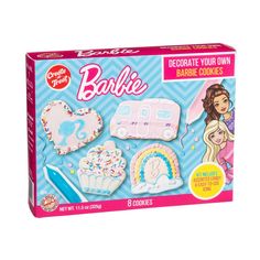 a box with cookies and icing for barbie dolls on it's front cover