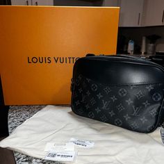 In New Condition Bumbag. Leather And Canvas Show No Signs Of Wear And Tear. Tags, Dustbag, Box(Available For An Additional Cost) Included. Bags Louis Vuitton, Leather And Canvas, Metal Tags, Wear And Tear, Louis Vuitton Men, Louis Vuitton Bags, Chest Bag, Grey Fashion, Mens Belts