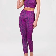 Nwt Onzie High Rise Midi Pink Snake Leggings Gorgeous!!! Midi Longer Than Capri, Shorter Than Full Longer. Color: Ultra Violet Snake Size M/L (Slim Fit) Waist 12 Flat Wide Waistband 5 Rise 10 Inseam 25 Gusset Crotch For Comfort Out Of Stock Online Stay Cool, Comfortable And Fully Supported While Sweating It Out With Style! Silky Soft 76% Polyester, 24% Spandex Smoke-Free Home Bin: Leggings #22m Tags: Reptile Gym Fitness Yoga Lifting Purple High Waist Stretch Yoga Pants, High Waist Stretch Purple Yoga Pants, High Waist Purple Leggings For Gym, Purple High Waist Stretch Activewear, Purple Tight Activewear For Yoga, Casual Purple High Waist Activewear, Fitted Purple Pants For Loungewear, High Stretch Purple Gym Pants, Purple High Waist Workout Leggings