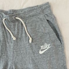 Nike Grey Sweatpants Small Cropped Never Worn Nike Cotton Pants For Summer, Nike Casual Short Pants, Nike Bottoms For Spring Loungewear, Nike Casual Pants For Spring, Nike Cotton Joggers For Spring, Nike Joggers For Spring Loungewear, Nike Spring Joggers For Loungewear, Nike Leisure Pants For Spring, Spring Nike Joggers For Loungewear