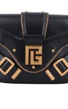 The Balmain Blaze Leather Shoulder Bag in black boasts an adjustable top leather shoulder strap for added convenience, secured with a snap flap closure. Its gold flap logo and double buckle detail on the front add a touch of sophistication. Plus, the bag features a flat back pocket and interior flat pocket within the spacious main compartment. Size and fit: H 6"/15cm X L 9"/23cm X D 2.75"/7 cmStrap span: 24.9"/63 cmComposition: 100% Calfskin LeatherHardware: Golden metalSignature dust bag includ Chevron Jewelry, Shoes Flats Sandals, D 2, Belt Bag, Leather Crossbody Bag, Leather Crossbody, Leather Shoulder Bag, Calf Leather, Bucket Bag