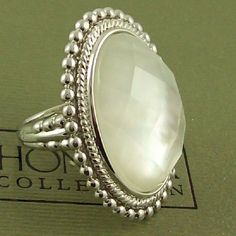 **********Final Sale - Price Is Firm*************** Honora Mother-Of-Pearl Oval Faceted Doublet Sterling Silver Ring. At The Center Of This Gorgeous Sterling Silver Ring Is A Bezel-Set Doublet Of Faceted Crystal Quartz And White Mother-Of-Pearl Framed By A Highly Polished Rope And Beaded Border. Finishing The Sophisticated Look Is A Decorative Beaded Design Along The Polished, Tapered Shank. *Ring Measures Approx. 1-1/4" Long X 1" Wide *Made In Italy White Oval Pearl Ring With Gemstone, White Oval Pearl Drop Rings, White Oval Pearl Ring, White Oval Pearl Jewelry, Oval White Pearl Jewelry, White Oval Pearl Ring Gift, Elegant Silver Oval Pearl Ring, White Oval Pearl Ring As A Gift, Oval White Gold Pearl Ring