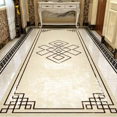 an ornately decorated hallway with white and black tiles on the floor is shown in this image