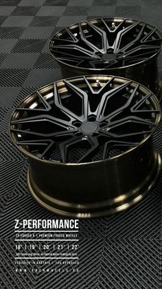 two black rims with silver spokes are shown in this advertisement for z - performance