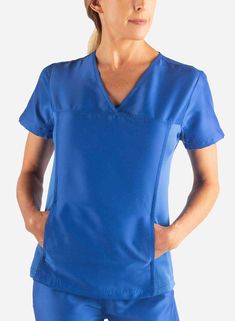 We’ve all got that shirt in our closet that we subconsciously gravitate towards. You know what we’re talking about. Well, we think this Hidden Pocket Scrub Top could be that one in your scrub collection. No joke here, this is hands down our most delightful scrub top. What makes this top so captivating? We like to think it’s the flexible, crossover V-neck and expandable mesh sides, that make it flattering while still letting you bust a move during those midday dance sessions (don’t pretend they d Nursing Scrubs Pattern, Scrubs Pattern, Scrub Collection, Royal Blue Scrubs, Scrubs For Women, Wonderwink Scrubs, Medical Scrubs Outfit, Fit Scrubs, Big Hoodies