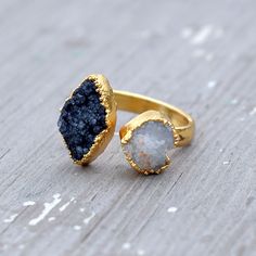 GemFormingStudio D E T A I L S Black Druzy Ring | Gemstone Ring | Rose Gold Ring, Brass Ring, Gold Plated Ring, Ring For Women, Ring For Her, Gift For Her, Unique Jewelry Ring Size : All Sizes Available Size : 20 x 10 mm Approx Weight : 5.50 Gm Color : White , Gold Shape : Marquise , Heart Material : Brass . Contact us for wholesale prices. R I N G S https://www.etsy.com/in-en/shop/GemFormingStudio?section_id=22783374 B E A D S https://www.etsy.com/in-en/shop/GemFormingStudio?section_id=22828835 Gift Rings With Raw Stone In Open Ring Shape, Round Raw Stone Promise Rings, Raw Stone Promise Ring, Adjustable Raw Stone Promise Ring, Gift Crystal Open Ring With Raw Stone, Promise Ring With Raw Stone Crystal Open Ring, Jewelry Rings Unique, Rough Stone Ring, Herkimer Diamond Ring