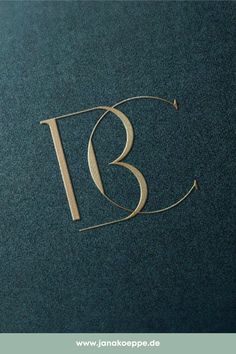 the letter b is made out of wood and has a thin line on top of it