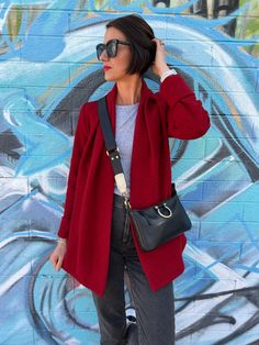 Embrace the weather in style in our chic swing coat that doubles as a wrap coat! Chic Shawl Collar Blazer For Fall, Chic Burgundy Blazer For Workwear, Chic Red Fall Blazer, Chic Red Outerwear With Notch Lapel, Belted Cardigan For Fall Workwear, Fall Workwear Belted Cardigan, Chic Red Notch Lapel Outerwear, Chic Long Sleeve Burgundy Blazer, Chic Red Cardigan For Fall