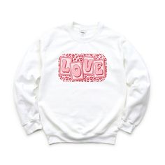 Looking for a cute versatile top to wear? Make sure to grab one of our Graphic Sweatshirts! This soft and comfortable shirt is the perfect top for any outfit. It can be paiWhite with biker shorts, Jeans, or the classic stay at home sweats! This sweatshirt is true-to-size, so be sure to order your regular size! If you are looking for a more oversized look, make sure to size up. Casual Sweatshirt With Heart Graphic For Loungewear, Heart Graphic Relaxed Fit Top For Loungewear, Casual Heart Graphic Top For Loungewear, Relaxed Fit Heart Graphic Top For Loungewear, Relaxed Fit Loungewear Tops With Heart Graphic, Cute White Sweatshirt For Everyday, Shorts Jeans, Stay At Home, Biker Shorts