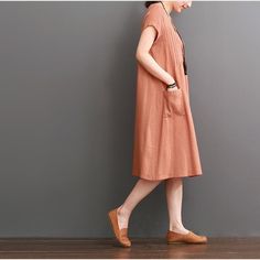 Orange cotton dresses summer short sleeve maxi dressThis dress is made of cotton linen fabric, soft and breathy, suitable for summer, so loose dresses to make you comfortable all the time.Measurement: Size M length 100cm / 39" Bust 100cm / 39" Shoulder 37cm / 14.43" Waist 128cm / 49.92" Sleeve Length 11cm / 4.29" Armhole 44cm / 17.16" Size L length 101cm / 39.39" Bust 104cm / 40.56" Shoulder 38cm / 14.82" Waist 132cm / 51.48" Sleeve Length 12cm / 4.68" Armhole 46cm / 17.94"Materials used: Cotton Cotton Dresses Summer, Dresses To Make, Short Sleeve Maxi Dress, Loose Dresses, Short Sleeve Maxi Dresses, Cotton Dress Summer, Cotton Linen Fabric, Sleeve Maxi Dress, Dresses Summer