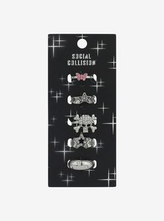 When edgy meets cute! This silver-tone ring set features butterfly  star and skull designs adorned with pink and clear rhinestones. Emo Rings, Grunge Ring, Social Collision, Star Skull, Hello Kitty Room Decor, Black Deck, Hot Topic Jewelry, Skull Designs, Hello Kitty Rooms