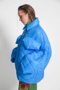 Unisex quilted jacket "Lupinus Light Blue" features a round shoulder and oversized fit for a relaxed, comfortable feel. It's made from lightweight, wrinkle-free polyester and has large pockets, windproof, and water repellent properties. The soft, bold shape makes it a statement piece, and the hypoallergenic synthetic padding adds warmth without compromising style.Size Guide:ONE SIZE (fits to XS-XL)Collar - 51 cmWides middle line - 170 cmBottom line - 140 cmSleeve ends - 57 cmLength from the neck Light Blue Jacket, Blue Jacket, Wrinkle Free, Quilted Jacket, Repellent, Water Repellent, Size Guide, Light Blue, Sleeve Length